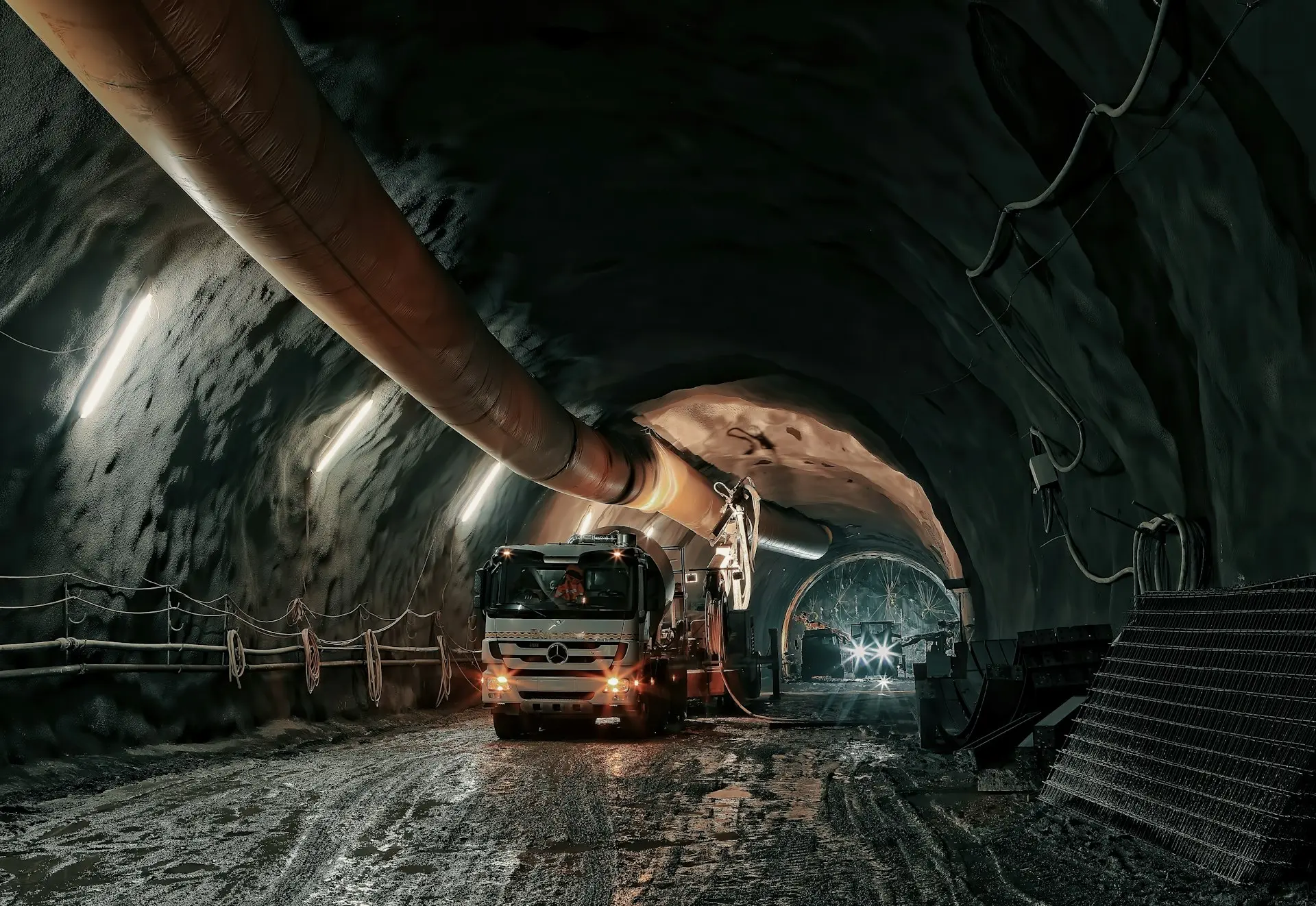 red and black truck in tunnel